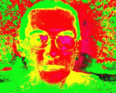 Close Up Man With Glasses Colorful Background GIF