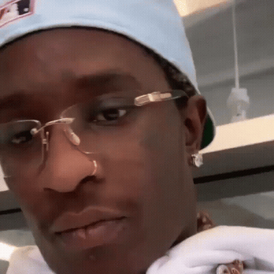 Close Up Man With Glasses Nose Ring And Hat GIF