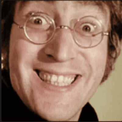 Primer plano hombre con gafas sonriendo GIF