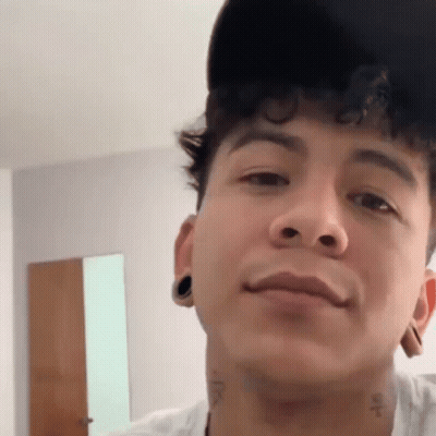 Close Up Man With Hat And Neck Tattoo GIF