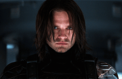 Close Up Man With Long Hair And Blue Eyes GIF