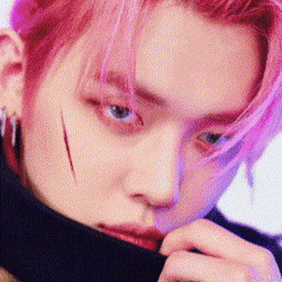 Close Up Man With Pink Hair and Scar