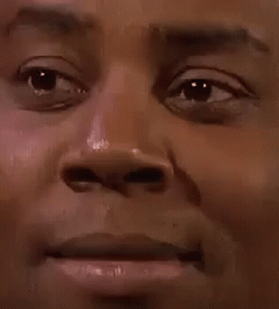 Close Up Of A Man With A Slight Smirk GIF