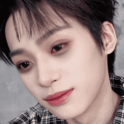 Close Up Of A Person In Plaid Shirt GIF