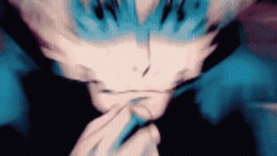 Close Up Of A Person's Face With Blurry Background GIF