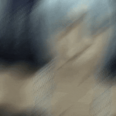 Close Up Of A Person's Face With Blurry Background GIF