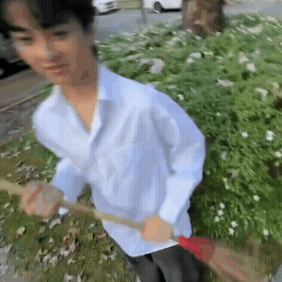 Close Up Of A Person With Letter R Behind GIF