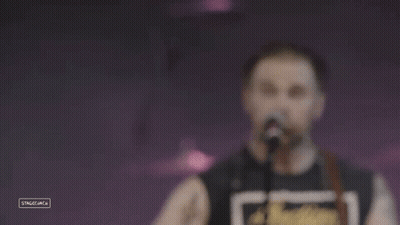 Close Up Of Alien Face With Black Eyes GIF