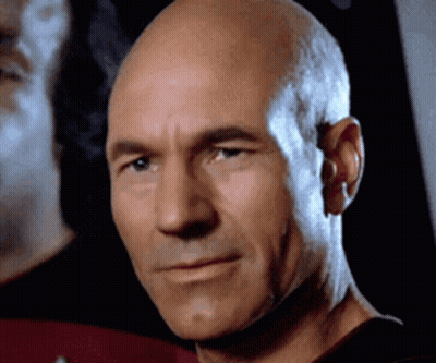 Close Up Of Bald Man Looking At Camera GIF