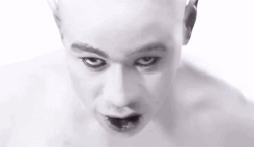 Close Up Of Bald Man With Black Eye GIF