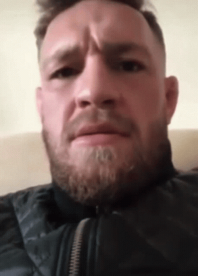 Close Up Of Bearded Man In Black Jacket GIF