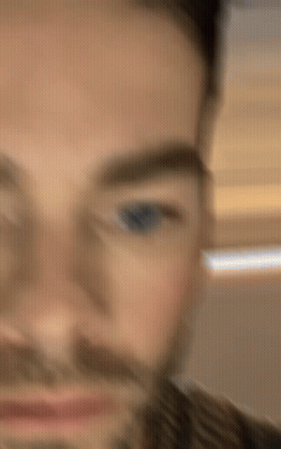 Close Up Of Bearded Man With Blue Eyes GIF