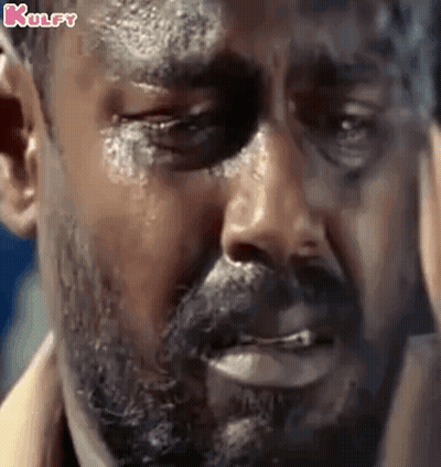 Close Up Of Bearded Man With Tear Running Down Cheek GIF