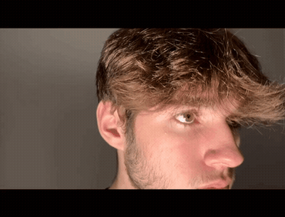 Close Up Of Bearded Person's Face GIF