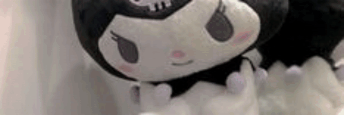 Close Up Of Black And White Stuffed Animal GIF