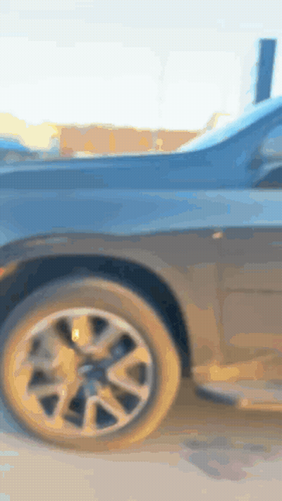 Close Up Of Black Car Wheel And Tire GIF