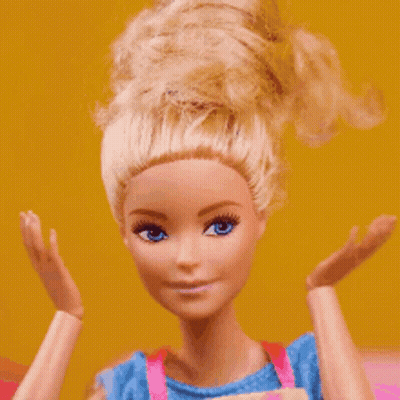 Close Up Of Blonde Barbie Doll GIF