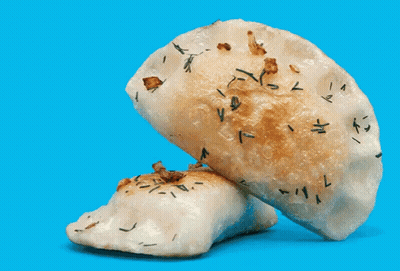 Close Up Of Bread On Blue Surface GIF