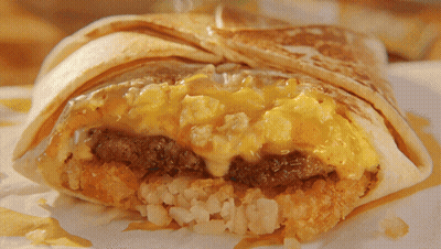 Close-Up Of Breakfast Burrito With Eggs And Meat GIF