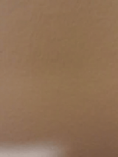 Close Up Of Brown Paper Texture GIF