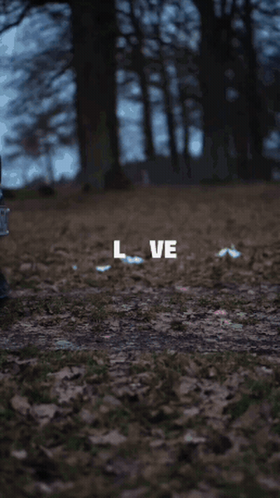 Close Up Of Car With Love Written On Side GIF