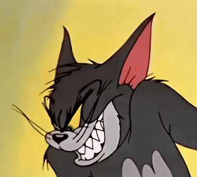 Close Up Of Cartoon Cat With Yellow Eyes GIF