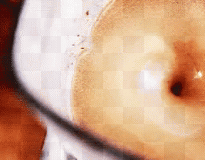 Close Up Of Coffee Cup With Foam GIF