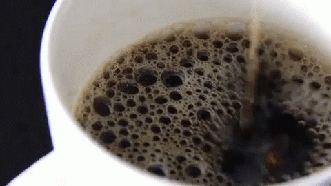 Close Up Of Coffee With Bubbles GIF