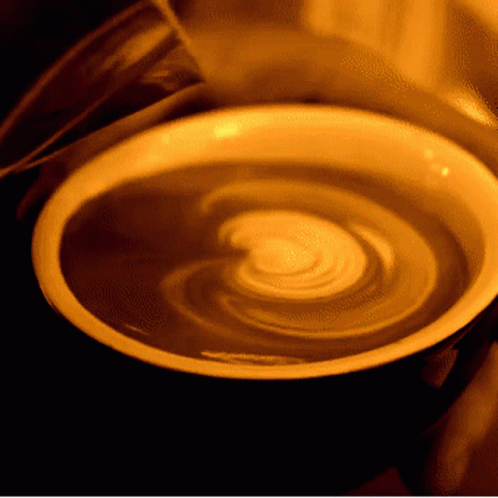 Close Up Of Cup Of Coffee With Swirl GIF