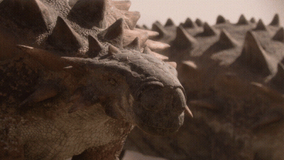 Close Up Of Dinosaur Head With Spikes GIF