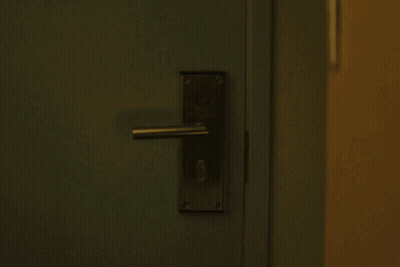 Close Up Of Door Handle With Key GIF