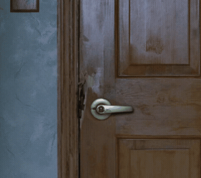 Close Up Of Door With Handle And Blue Wall GIF