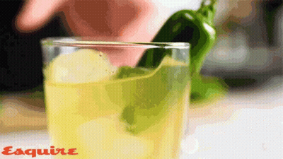 Close Up Of Drink With Esquire GIF
