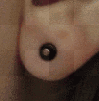 Close Up Of Ear With Piercing GIF