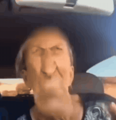 Close Up Of Elderly Woman Face In Car GIF