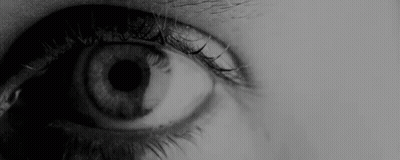 Close Up Of Eye With Black Pupil GIF