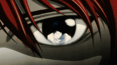 Close Up Of Eye With Red Hair And White Pupil GIF
