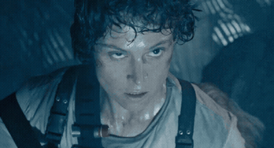Close Up Of Face In Blue Light GIF