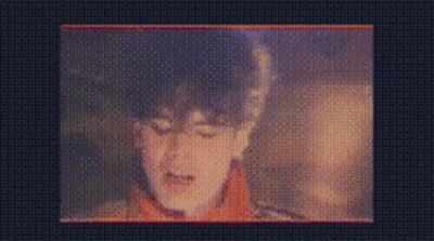 Close Up Of Face On Screen With Dots GIF