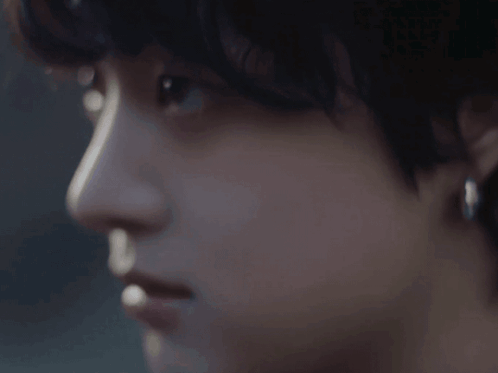 Close Up Of Face With Earrings GIF