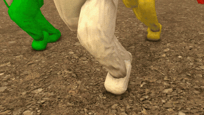 Close Up Of Feet In Green Socks And Yellow Shoes GIF