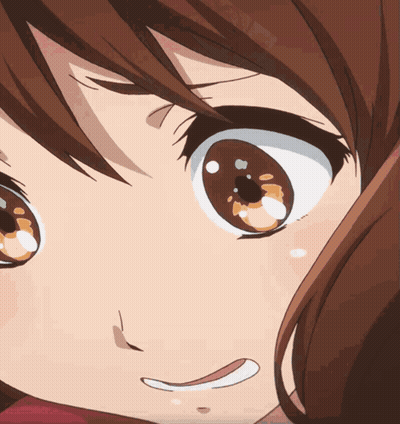 Primer plano de ojos de niña con sonrisa GIF