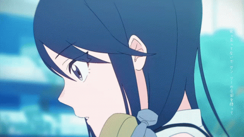 Close Up Of Girl's Face With Blue Background GIF