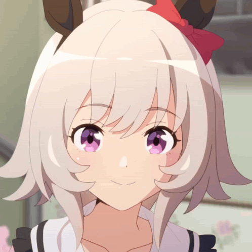 Close Up Of Girl's Face With Red Bow In Hair GIF