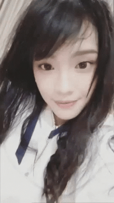 Close Up Of Girl With Long Black Hair GIF