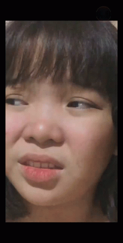 Close Up Of Girl With Slight Smile GIF