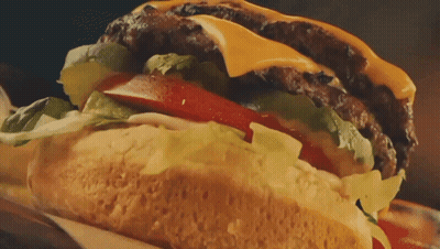 Close Up Of Hamburger With Lettuce And Tomatoes GIF