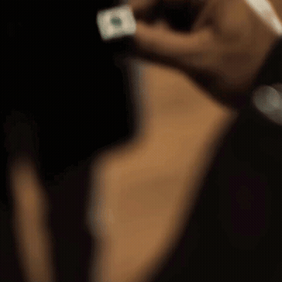 Close Up Of Hand Holding Green Lantern Ring GIF