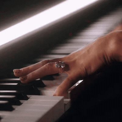 Close Up Of Hand On Piano Keyboard GIF
