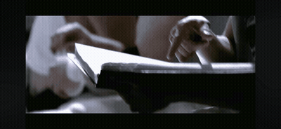 Close Up Of Hands Holding Paper GIF